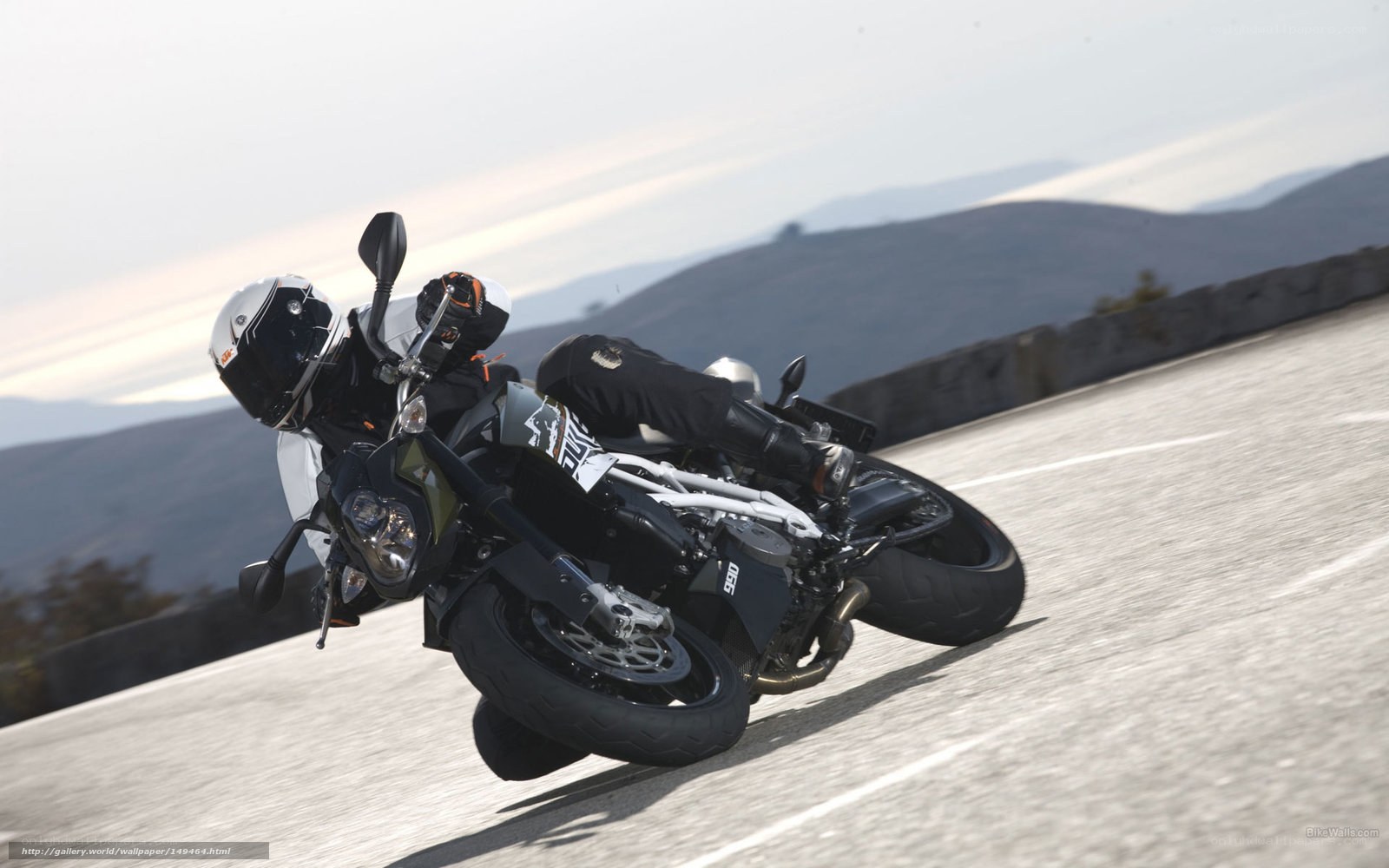 motorcycle rider on a winding road