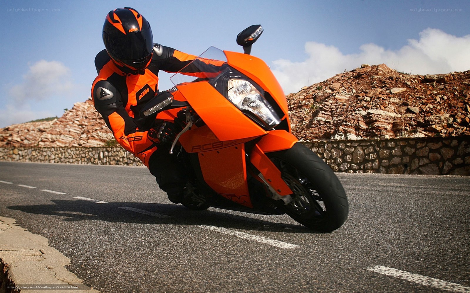 Motorcycle rider on a winding road