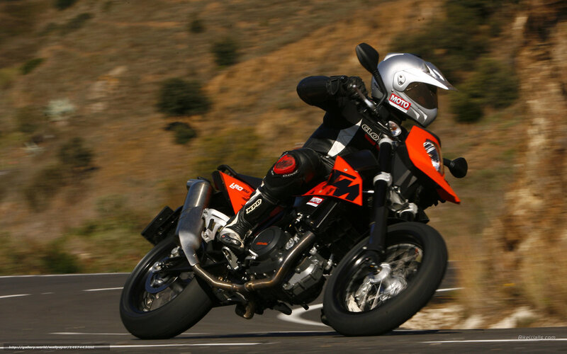 motorcycle rider on a winding road