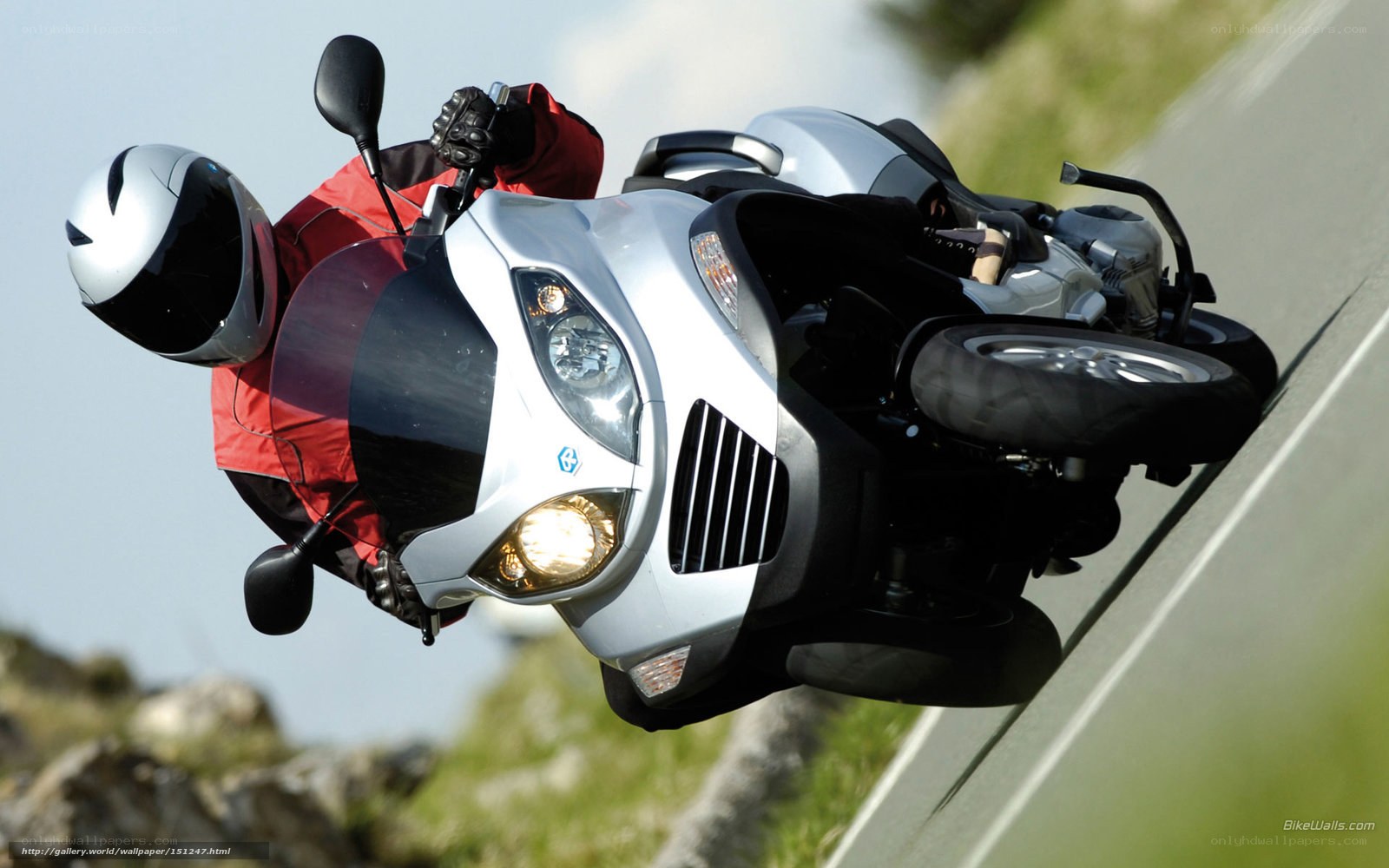 motorcycle rider on a winding road