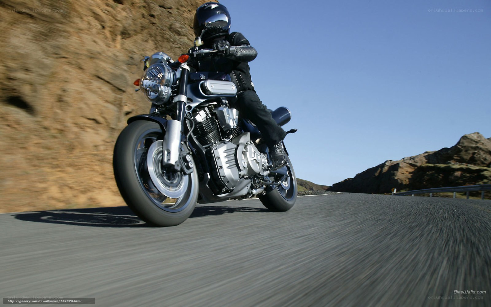 motorcycle rider on a winding road