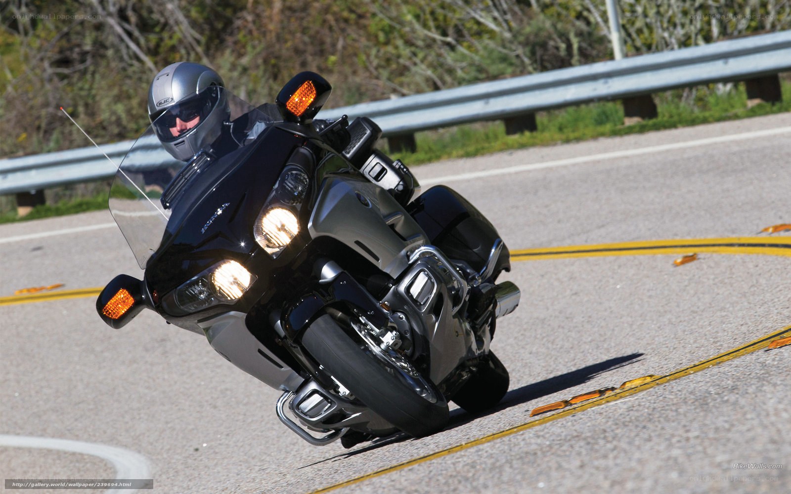 Motorcycle rider on a winding road