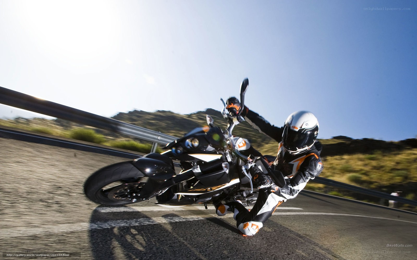 motorcycle rider on a winding road