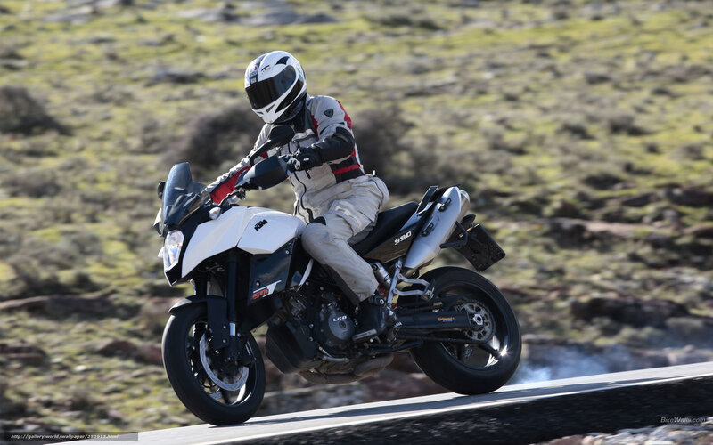 motorcycle rider on a winding road