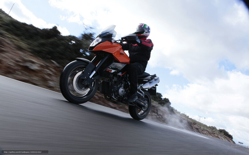 motorcycle rider on a winding road
