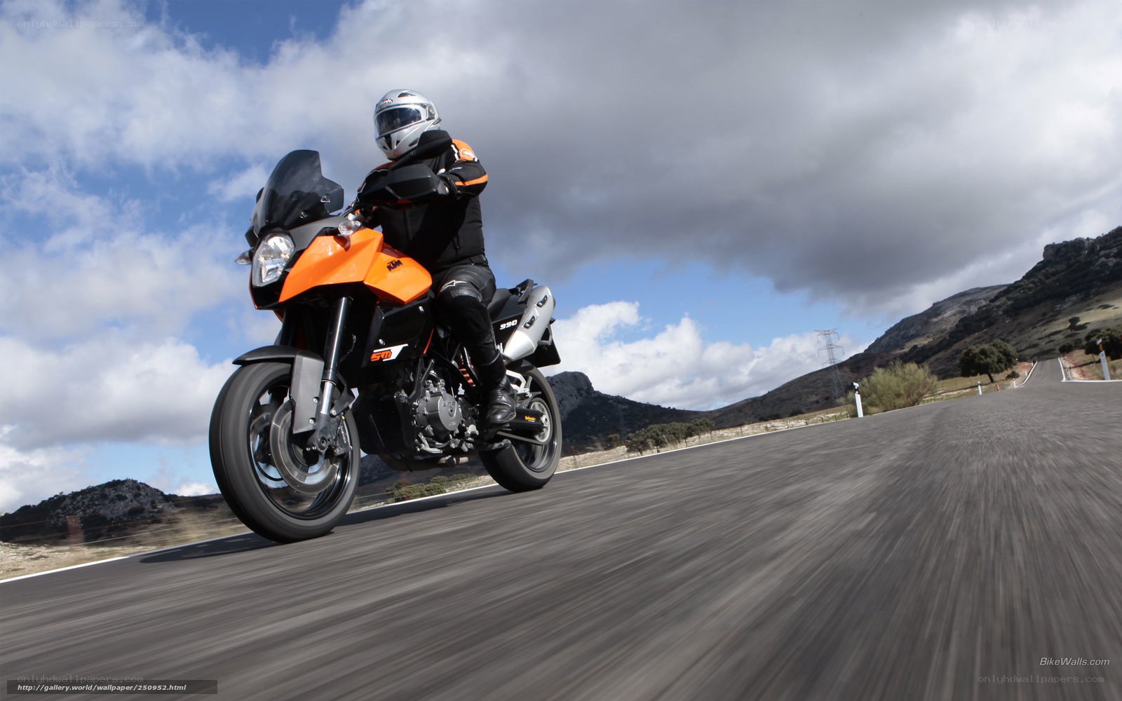 motorcycle rider on a winding road