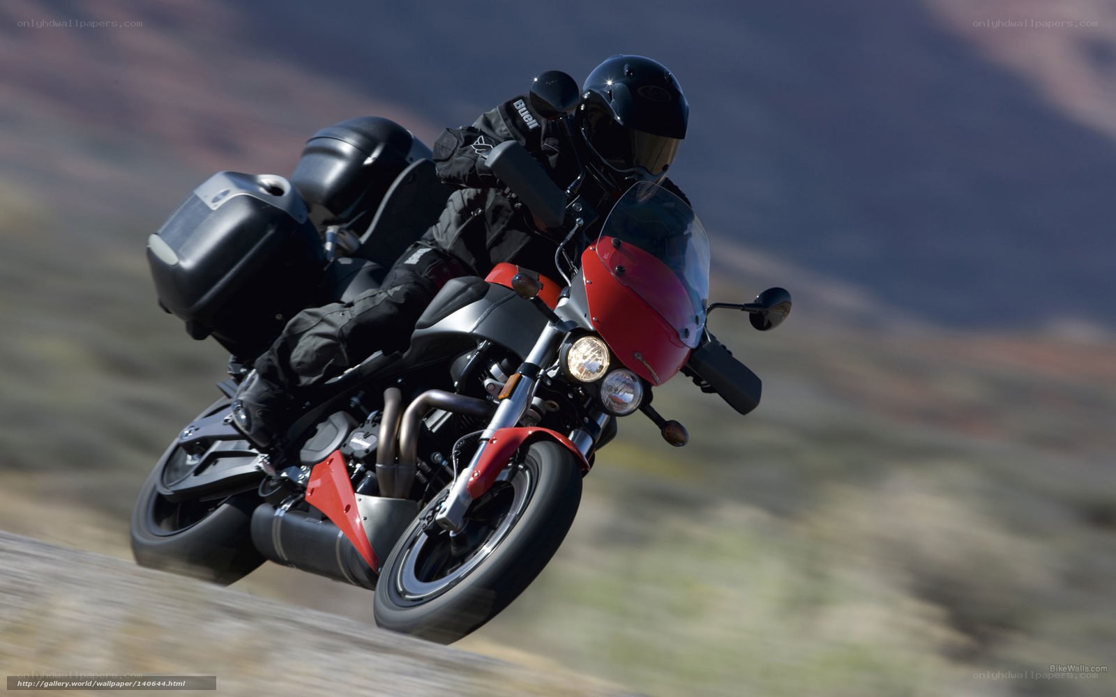 motorcycle rider on a winding road
