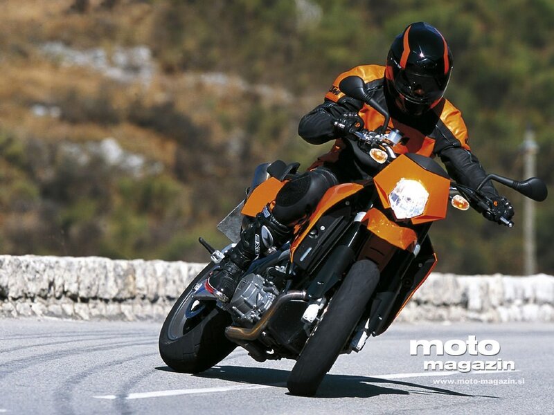 Motorcycle rider on a winding road