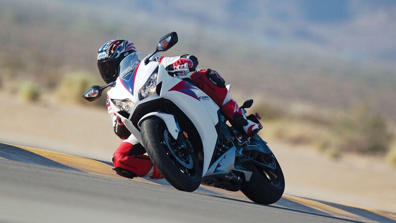 motorcycle rider on a winding road