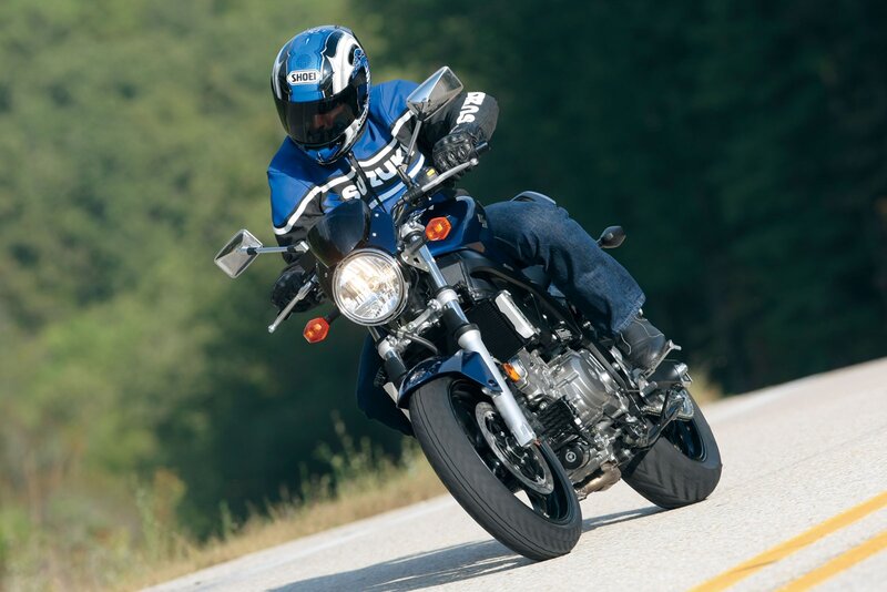 Motorcycle rider on a winding road