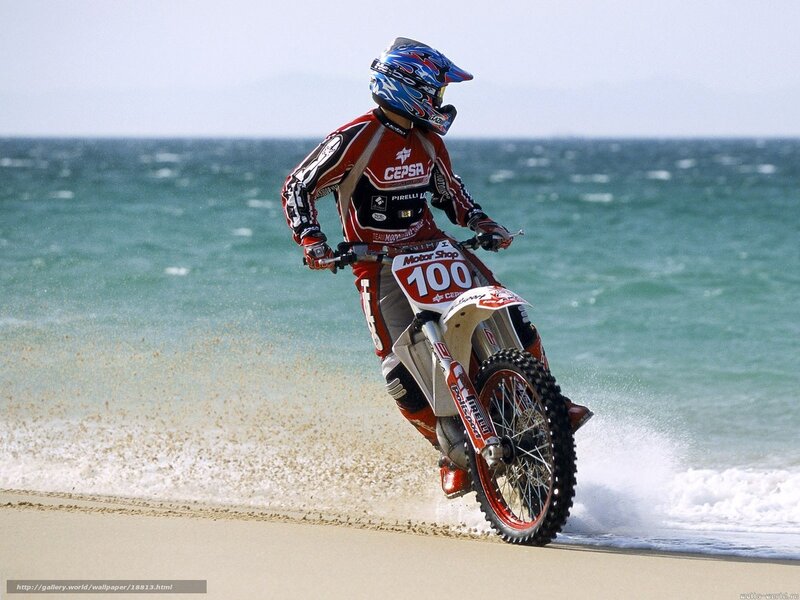 motorcycle rider on beach