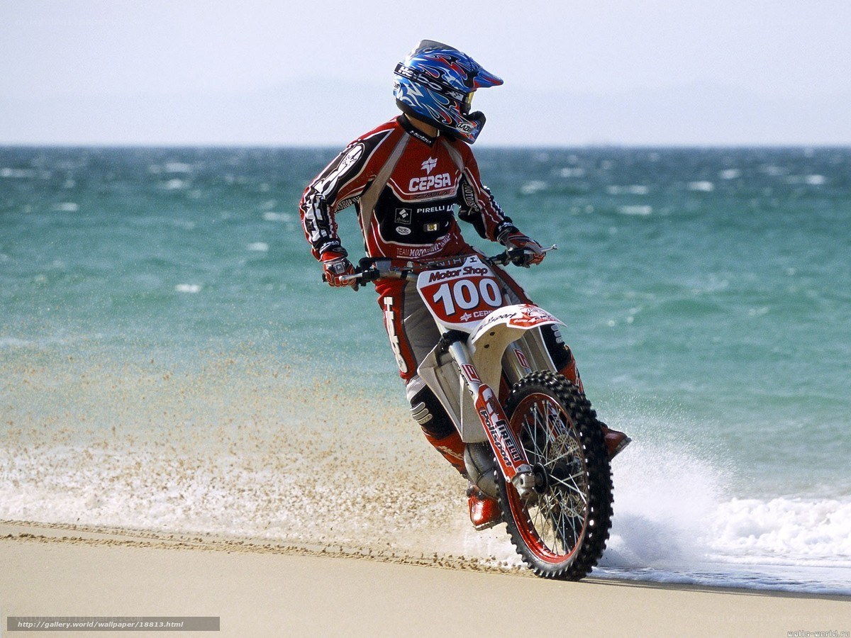 motorcycle rider on beach