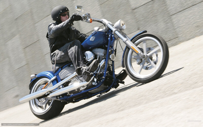 Motorcycle Rider on Blue Bike