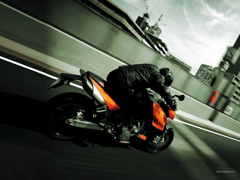 Motorcycle rider on city highway