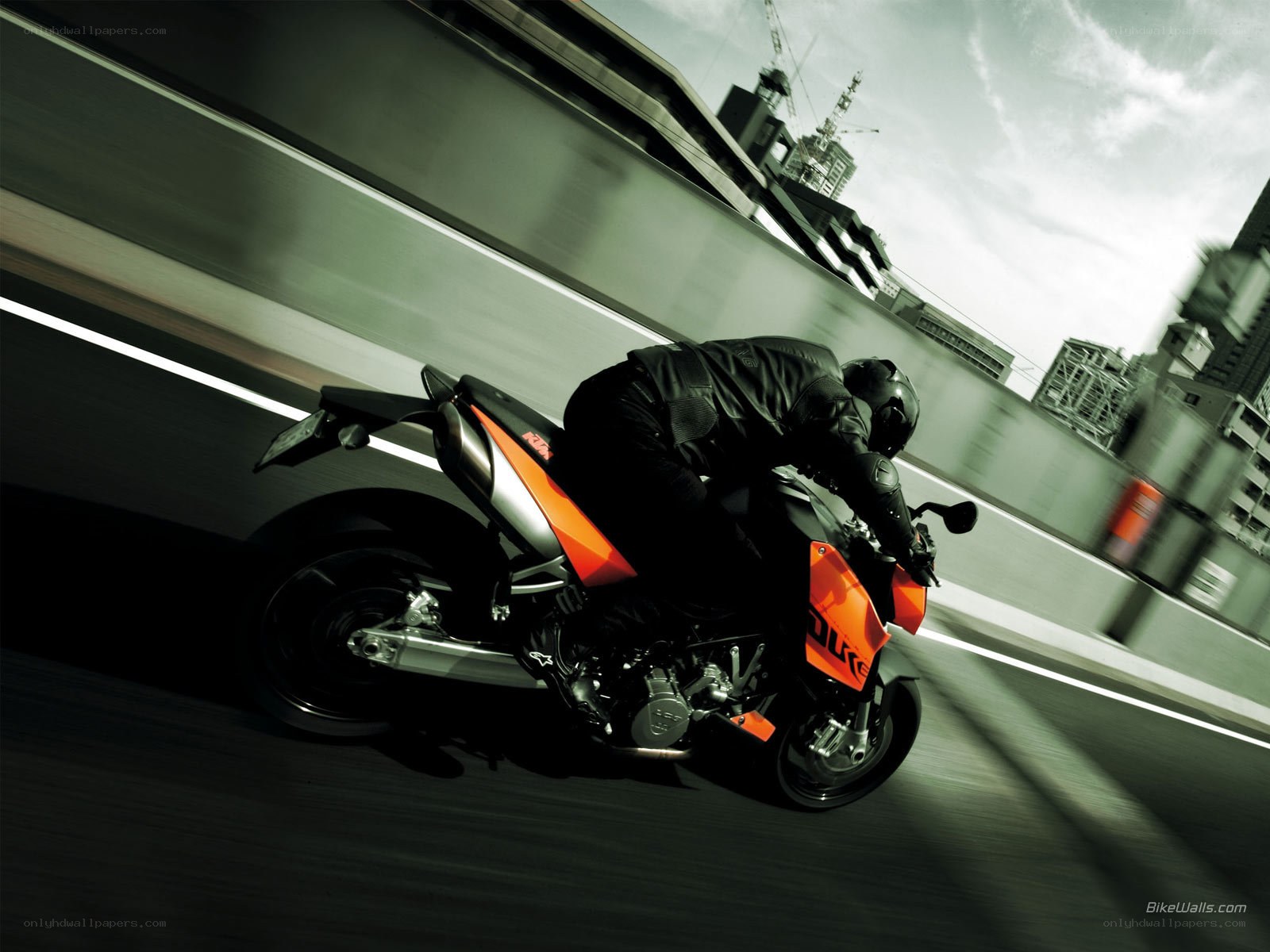 Motorcycle rider on city highway