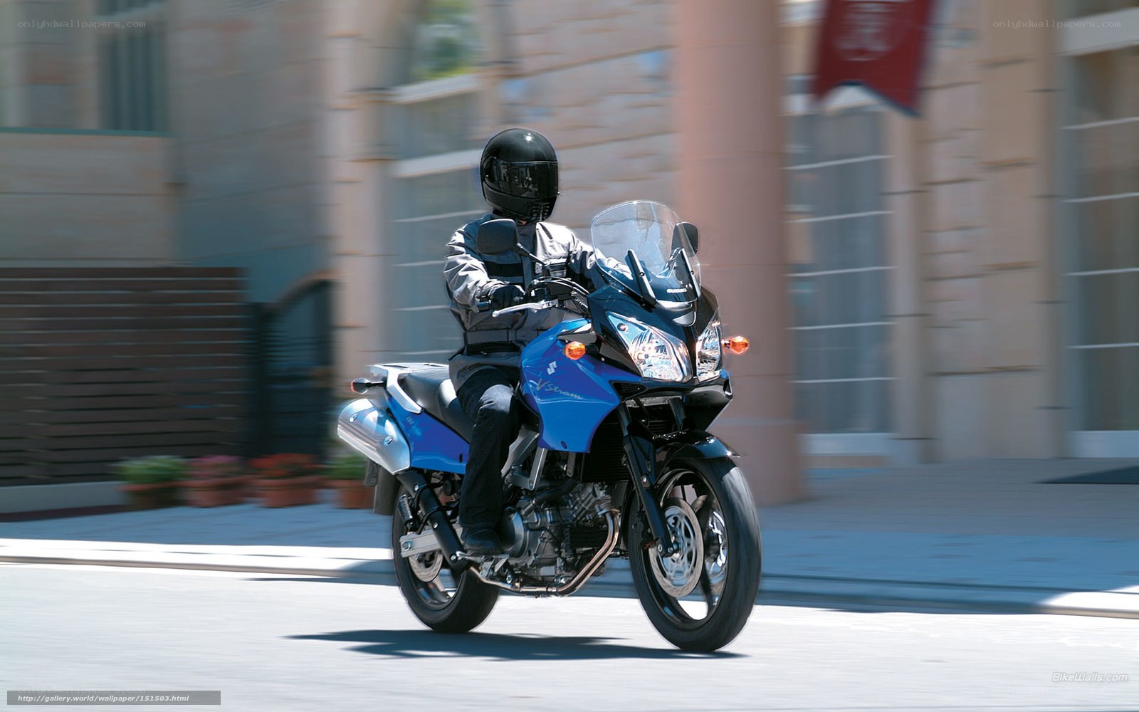 motorcycle rider on city street
