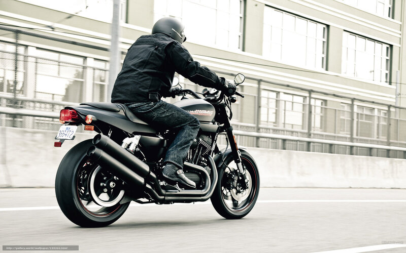 motorcycle rider on city street