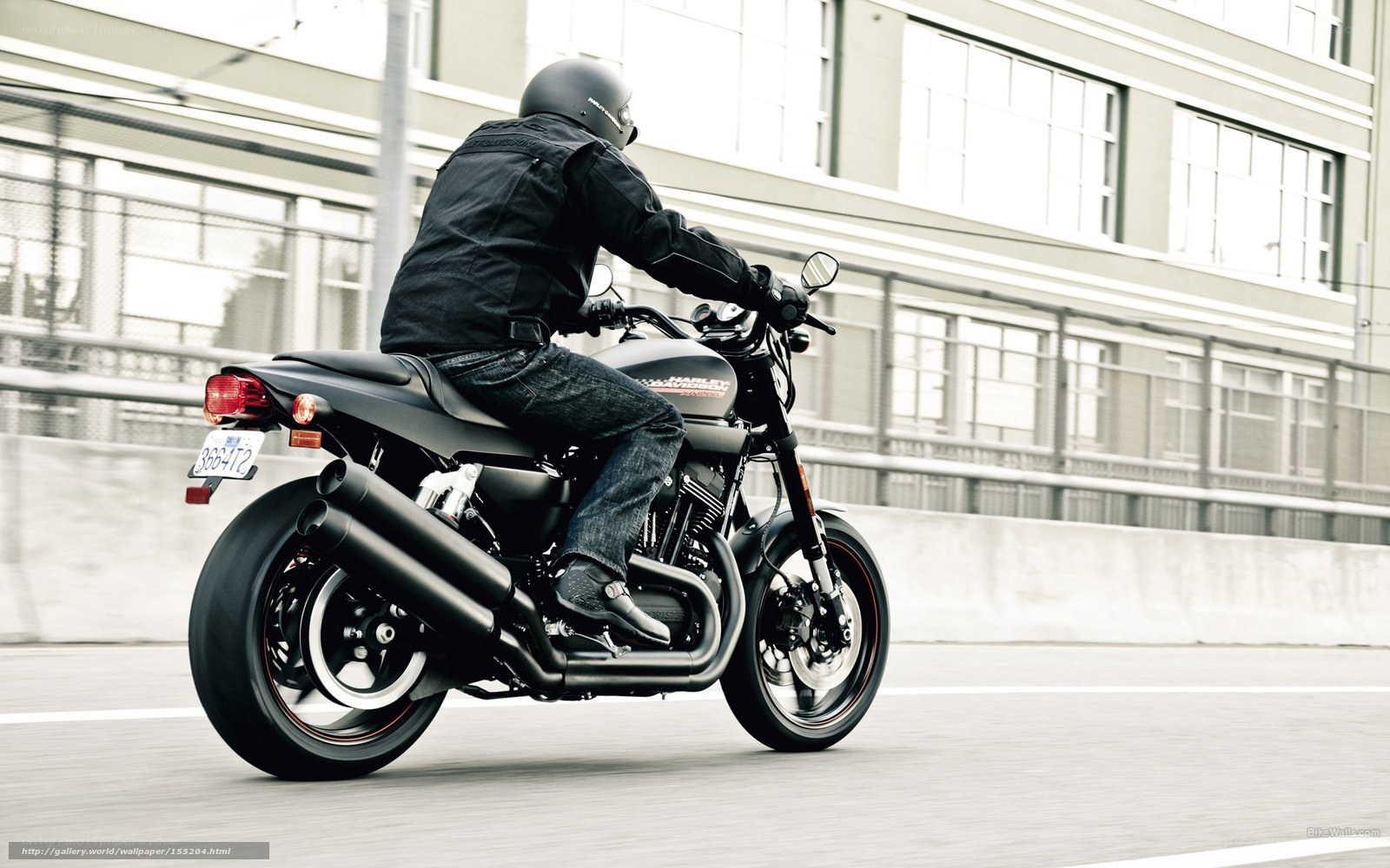 motorcycle rider on city street