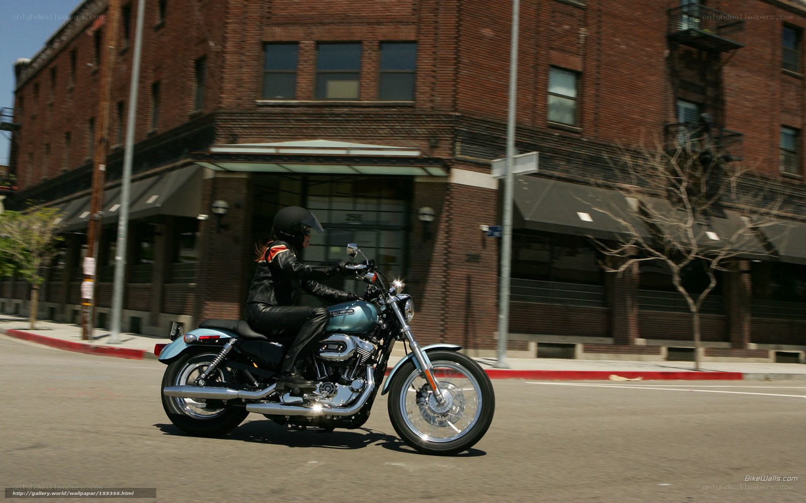 motorcycle rider on city street