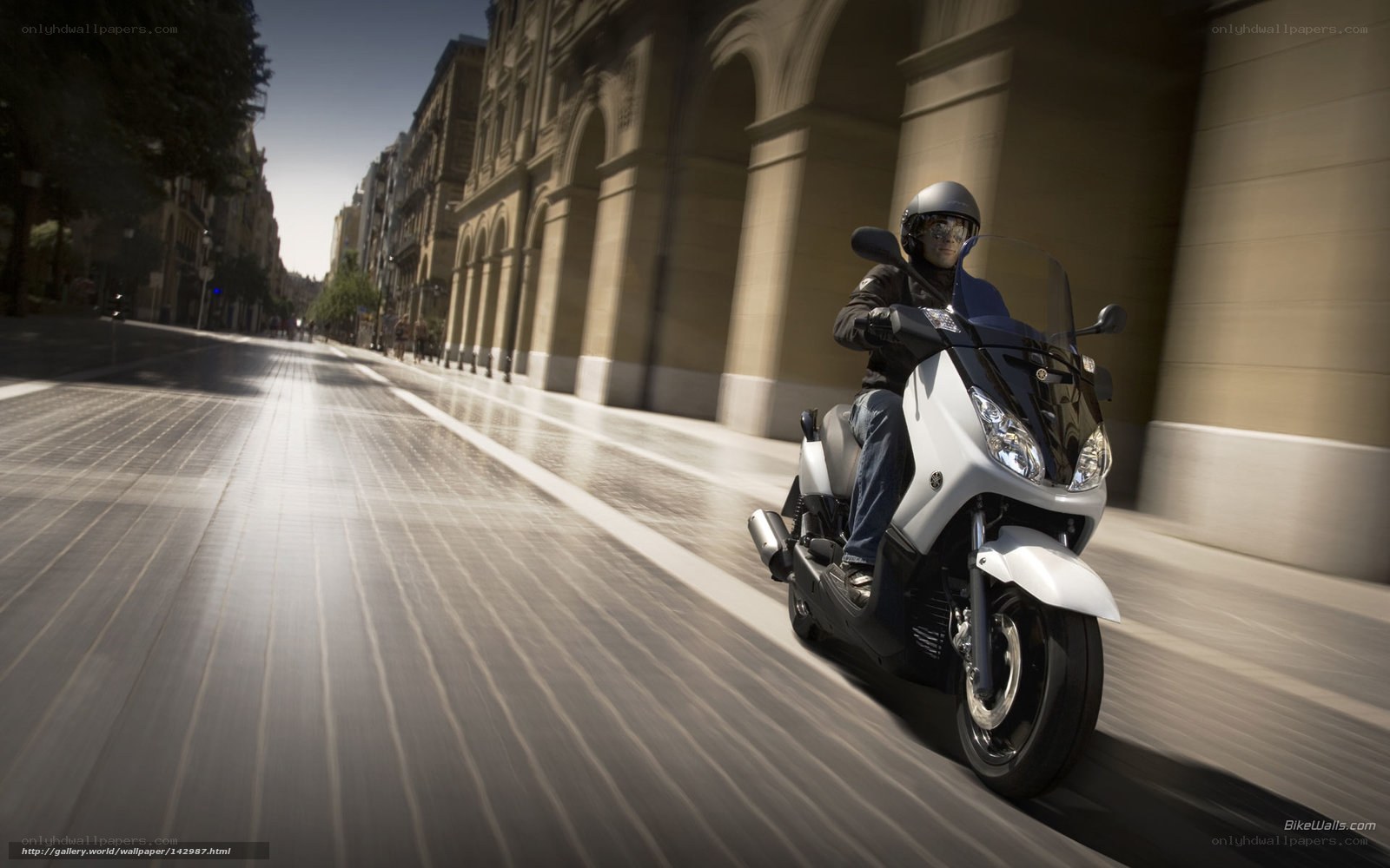 motorcycle rider on city street