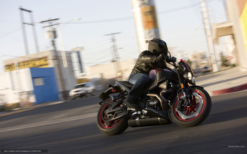 motorcycle rider on city street