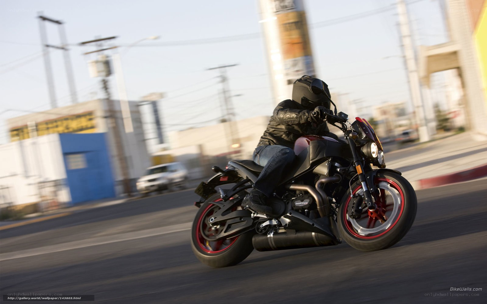 motorcycle rider on city street