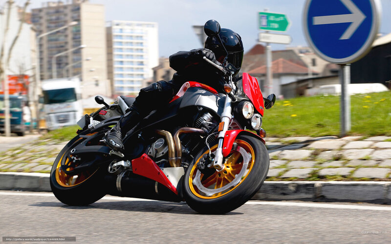 motorcycle rider on city street