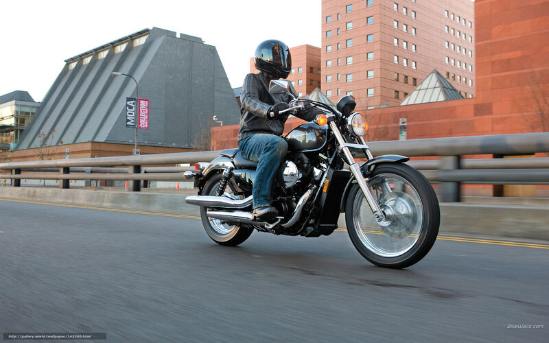 motorcycle rider on city street