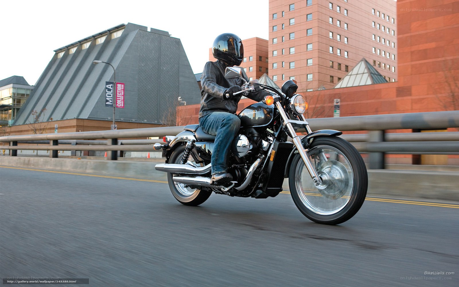 motorcycle rider on city street