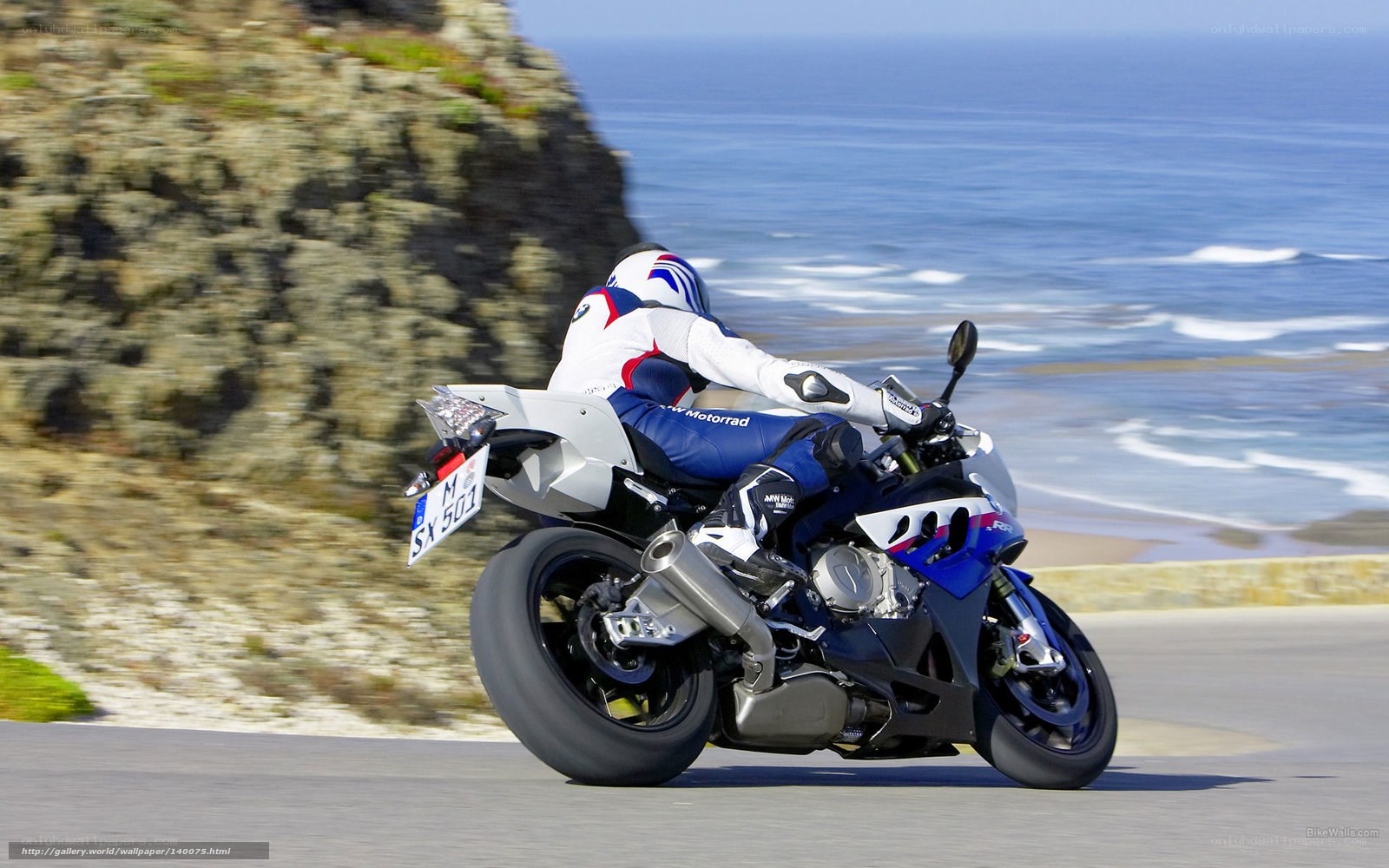 motorcycle rider on coastal road