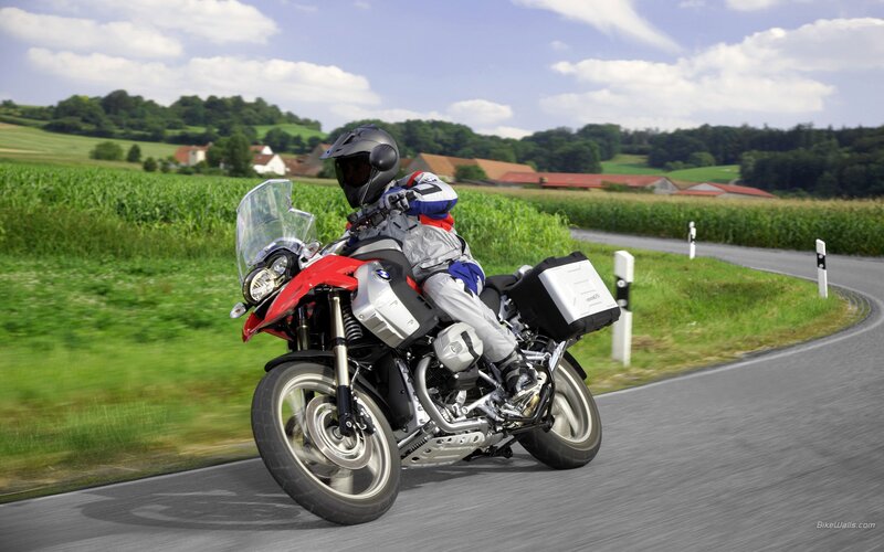 Motorcycle rider on country road