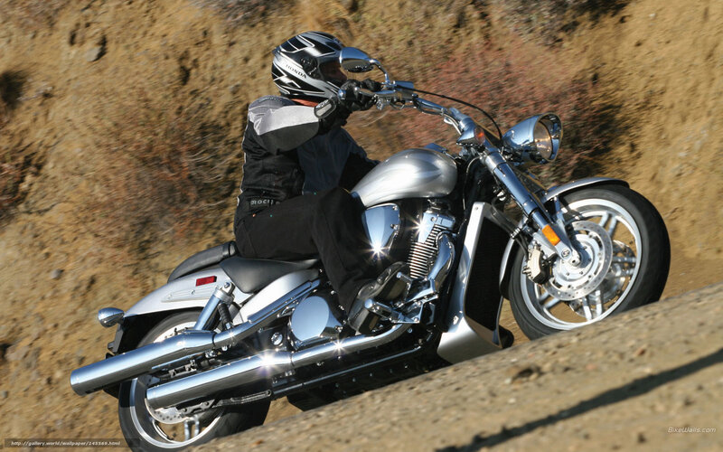 motorcycle rider on dirt road