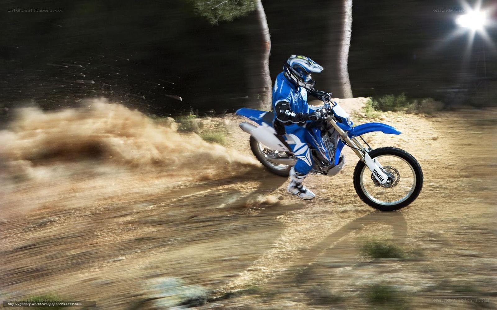Motorcycle rider on dirt track