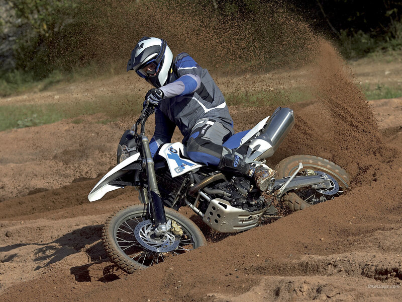 Motorcycle rider on dirt track
