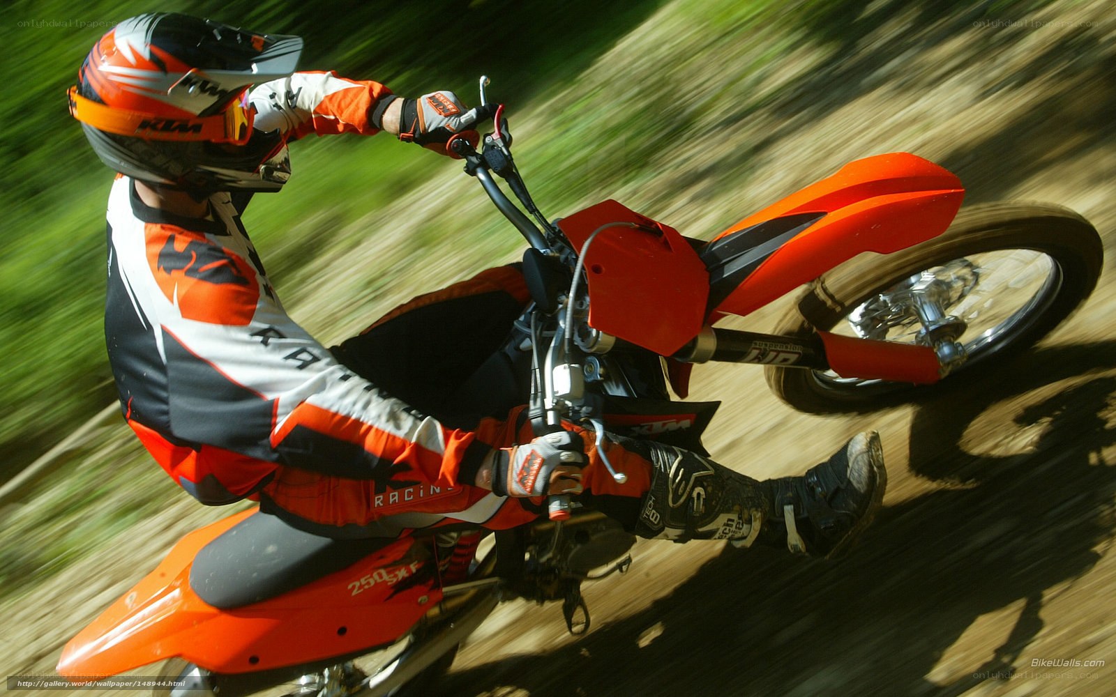 Motorcycle rider on dirt track