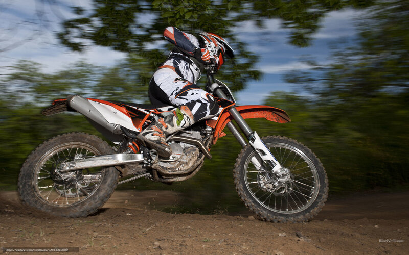Motorcycle rider on dirt track