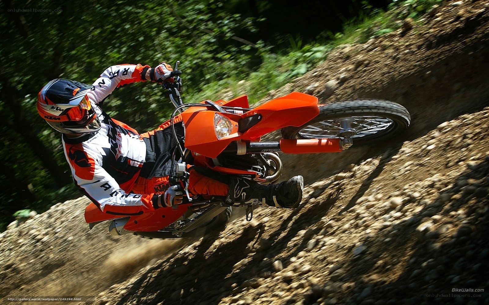motorcycle rider on dirt trail