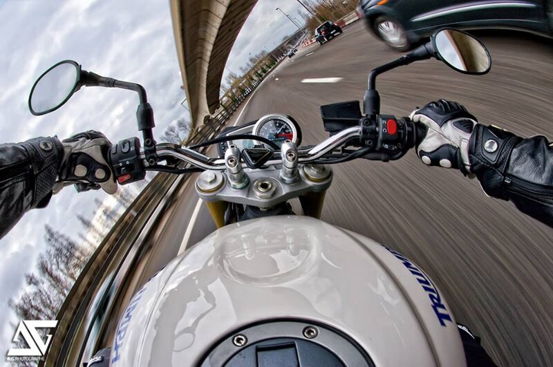 Motorcycle Rider on Highway — White