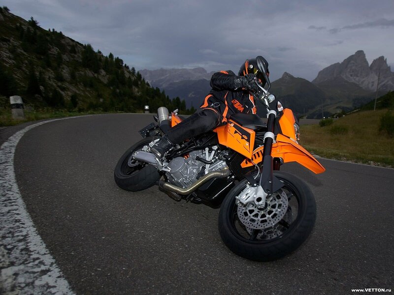 Motorcycle rider on mountain road