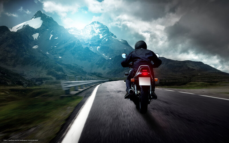 Motorcycle Rider on Mountain Road — Blue