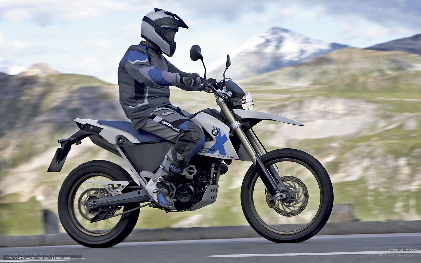 motorcycle rider on mountain road