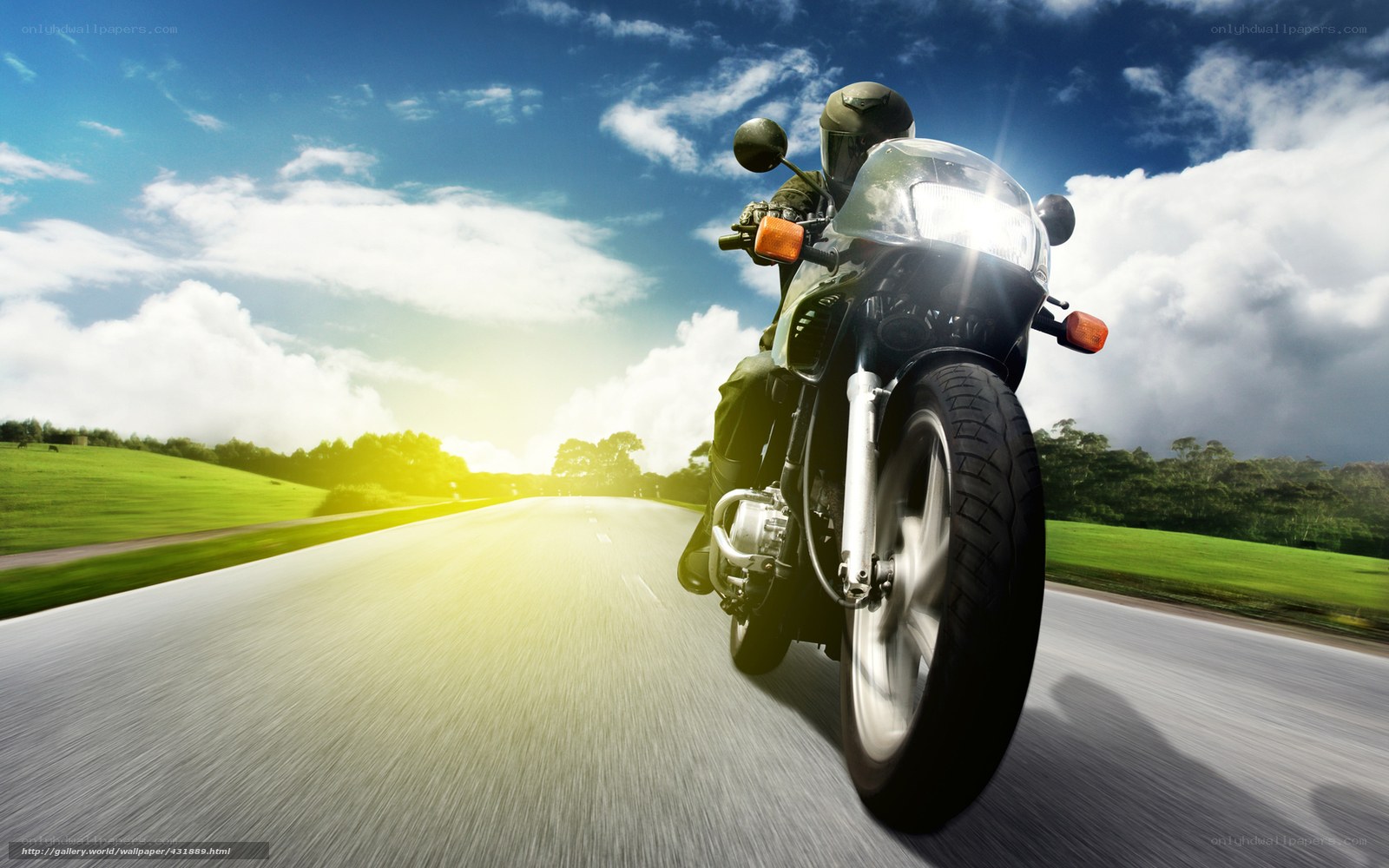 Motorcycle rider on open road