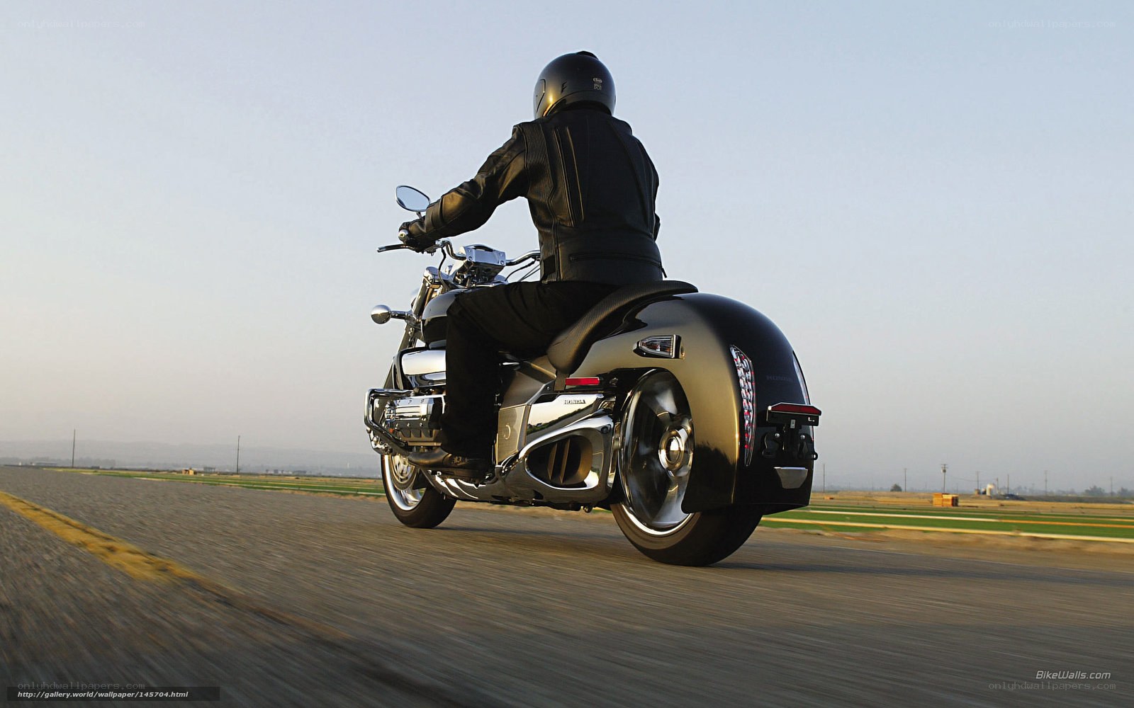 motorcycle rider on open road