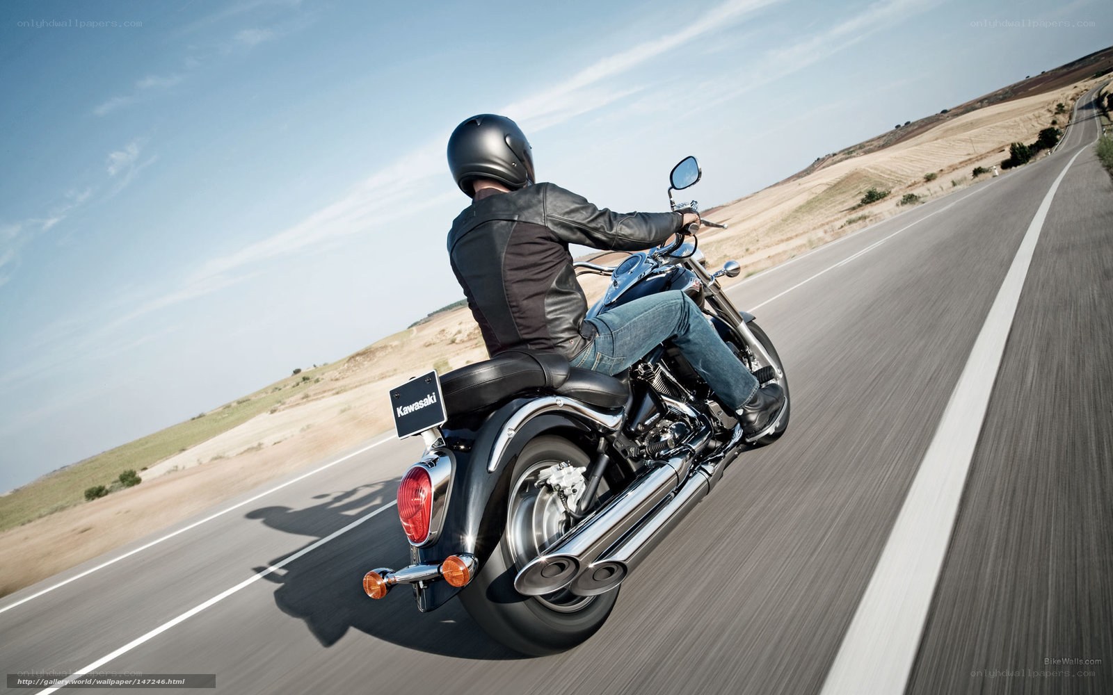 Motorcycle rider on open road