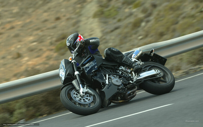 Motorcycle Rider on Road — Black, Dynamic, Afternoon, Photograph, Guardrail