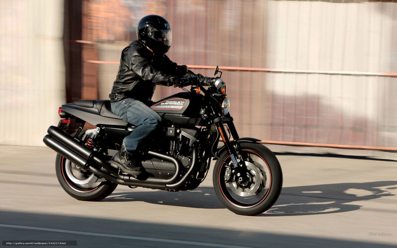 Motorcycle Rider on Road — Black, Dynamic, Afternoon, Photograph, Helmet, Building