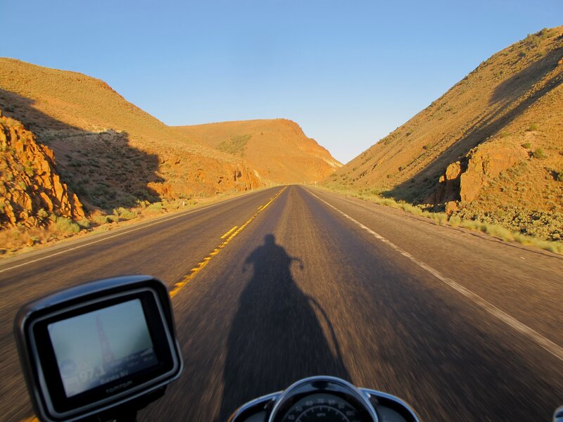 Motorcycle Rider on Road — Brown
