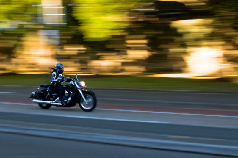Motorcycle Rider on Road — Green