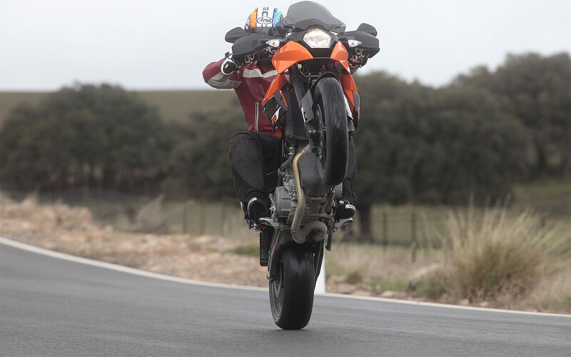 Motorcycle Rider on Road — Orange, Dynamic