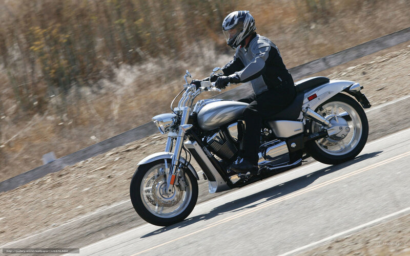 Motorcycle Rider on Road — Silver